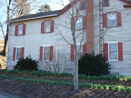 Recent photo of house where Grandma grew up. I wonder if Grandma once planted seeds in the same flower beds.
