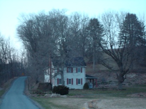 Recent photo of the house Grandma lived in. The photo was taken at dusk on a December day. 
