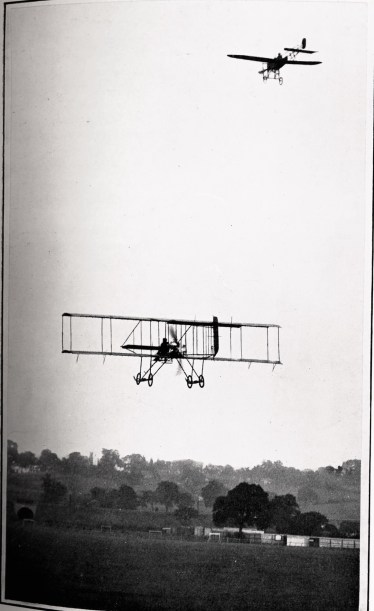 Caption:  A Bleriot monoplane descending and a Farman-type biplane ascending. The biplane is flying away from the camera and the monoplane is approaching from above. (Source: Aviation: An Introduction to the Elements of Flight (1913)