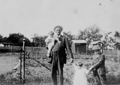 Curt Hester, holding Harold Swartz, with Marjorie Swart and Curt Hester Jr.