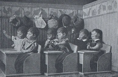 dolls in a classroom