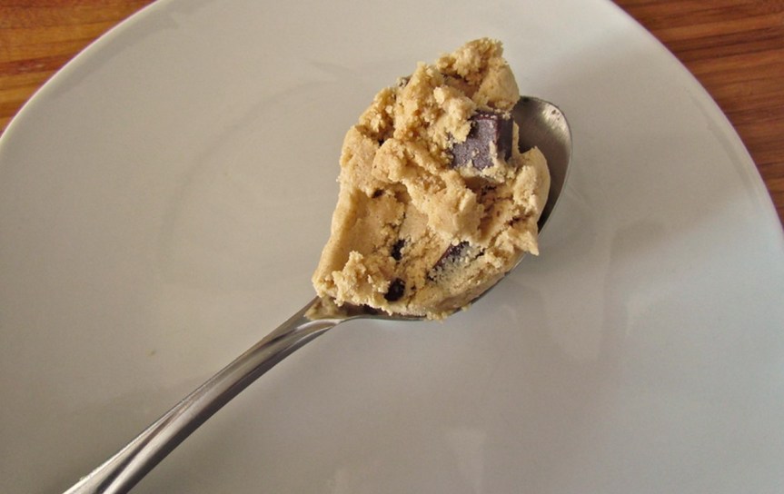 Chocolate chip cookie dough on spoon