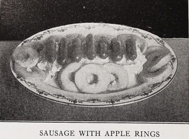 sausage links and apple rings on plate