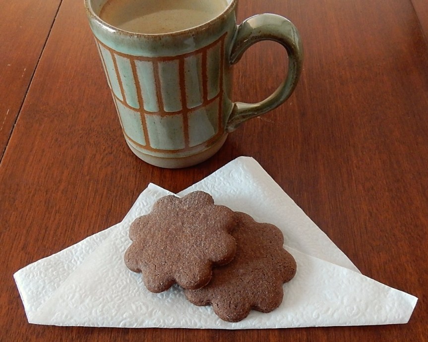 coffee mug and cookies on napkin