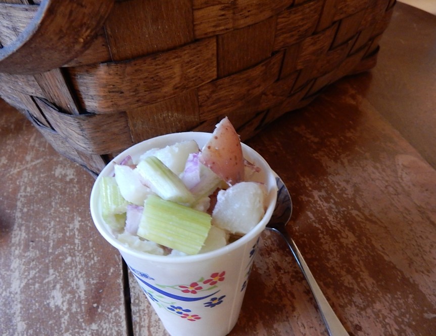 potato salad in a paper cup