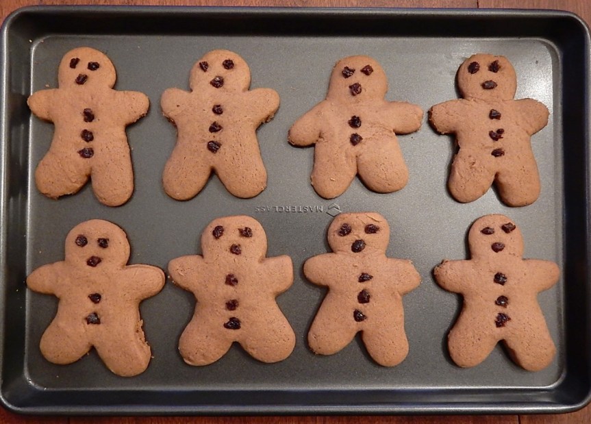Gingerbread men on baking sheet