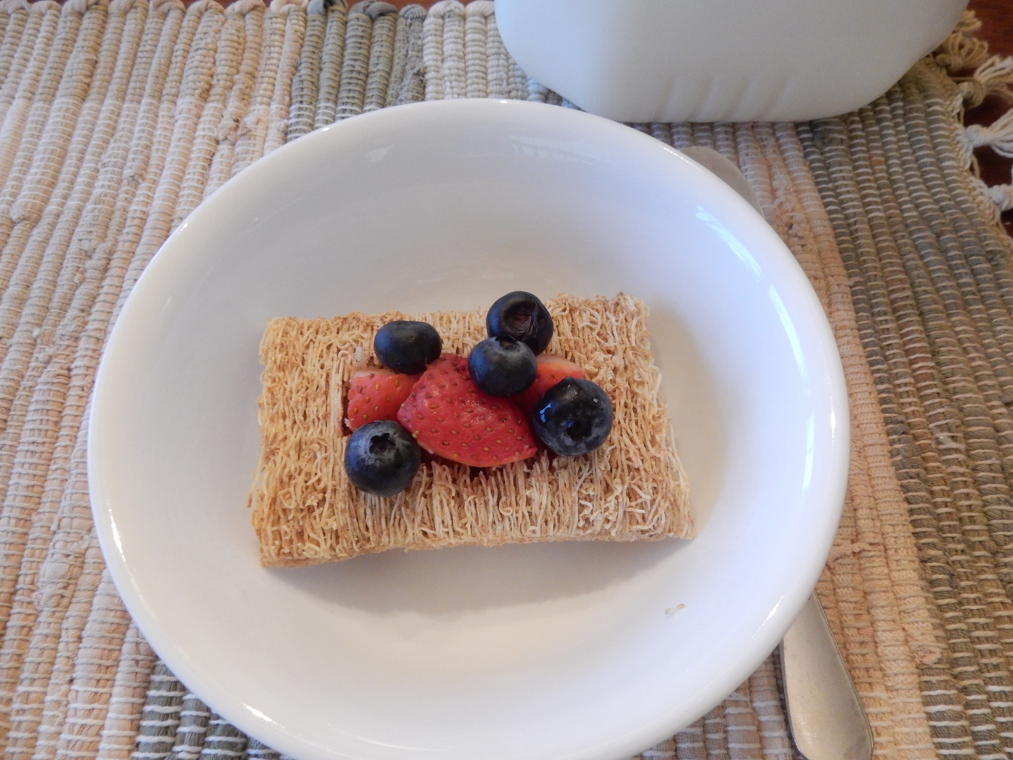 Shredded Wheat Biscuit with Strawberries and Blueberries