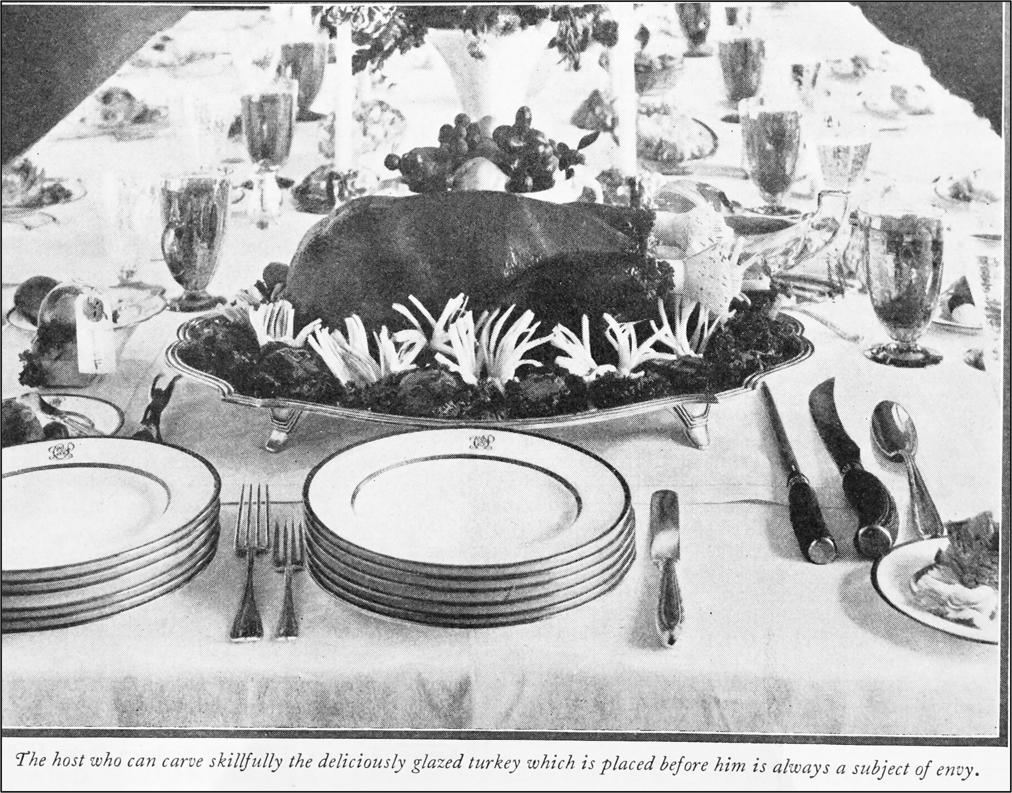 Table and plates with roasted turkey