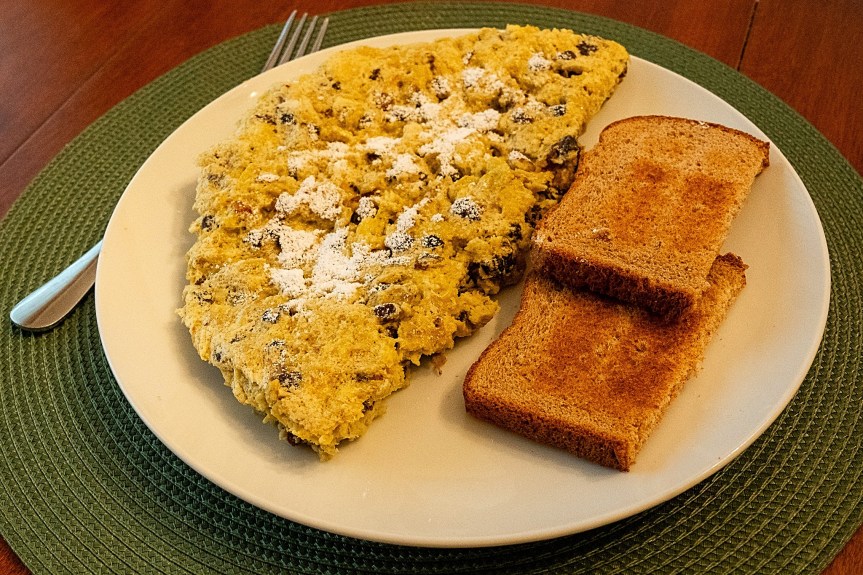 Raisin Nut Omelet with toast on plate