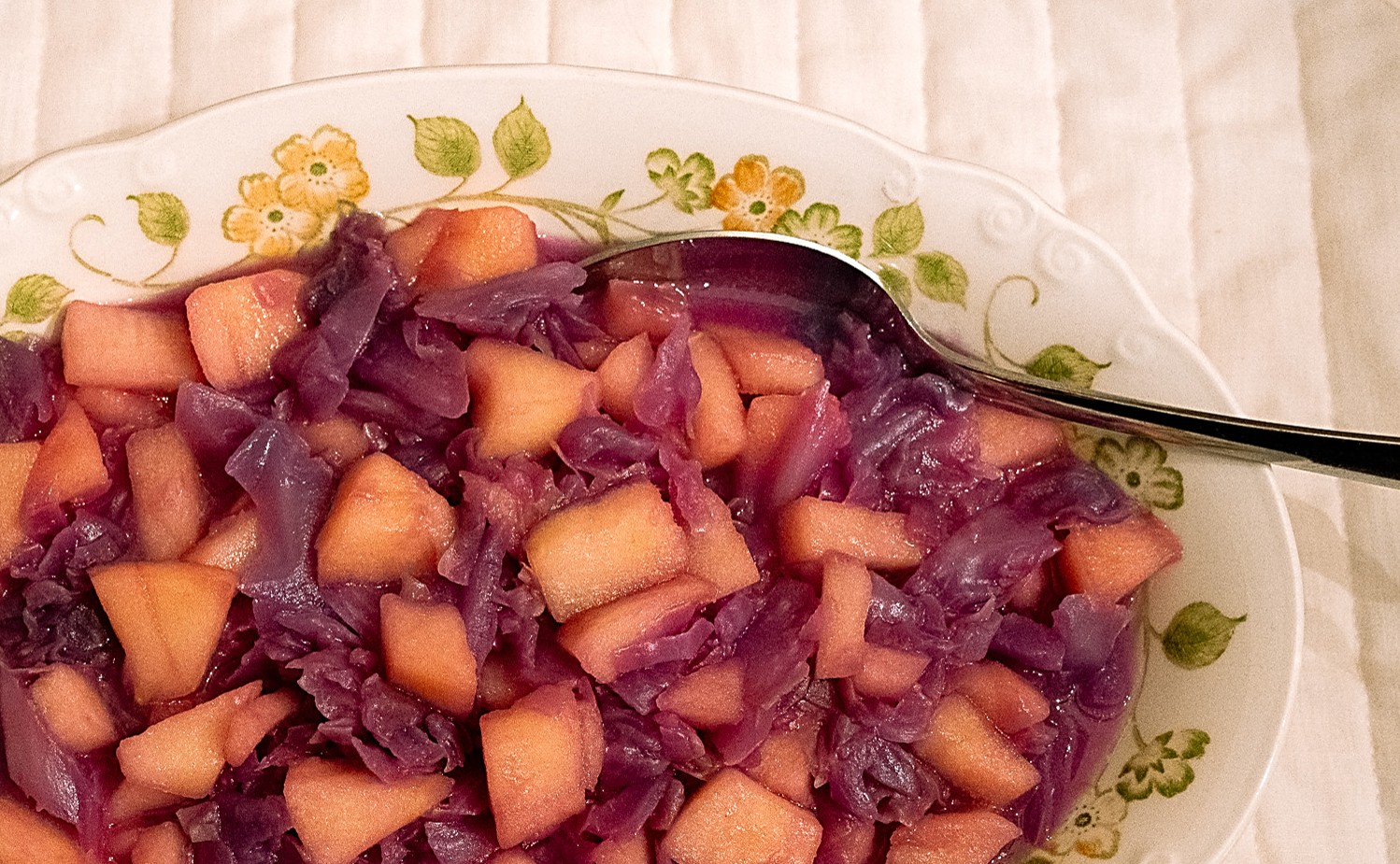 red cabbage and apples in dish